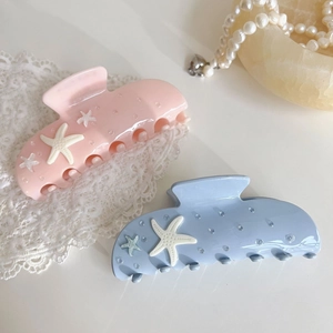 Pinces à cheveux élégantes en acétate avec étoiles de mer rose pastel et bleu ciel