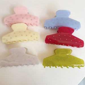Set of six colorful frosted resin shark hair claws with sparkling rhinestone accents