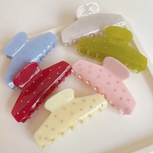 Elegant fan-shaped acetate hair claws with sparkling rhinestones in six colors