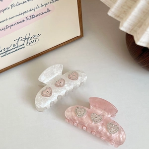 Sparkling rhinestone heart acetate hair claws in pearlescent pink and white set