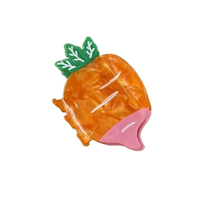 Cute carrot shaped hair claw clip in orange and green acetate with marble texture
