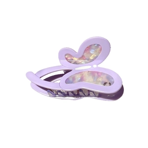 Elegant purple acetate butterfly hair claw clip with iridescent shell texture and metallic spring