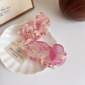 Elegant bird shaped acetate hair claw clips in pink marble and gradient finishes