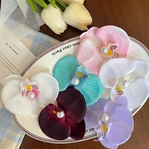 Phalaenopsis orchid hair clips with white pearls in multiple colors for women