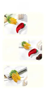 Detail view of creative corn and chili pepper shaped hair claws made of high gloss acetate