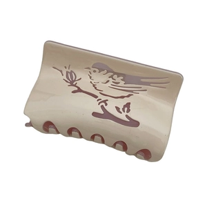Rectangle beige acetate hair claw clip with bird and floral hollow out design