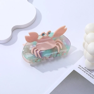 Pince à cheveux crabe en acétate iridescent avec strass pour une coiffure élégante