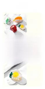 Detail of creative hair clips in sushi, milk, and egg shapes made of glossy acetate resin