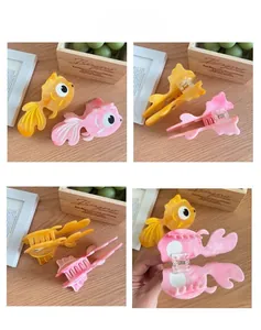 Detailed views of acetate whale hair clips showing claw structure and textures