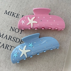 Set de pinzas para el cabello con estrellas de mar rosa y azul con strass brillantes