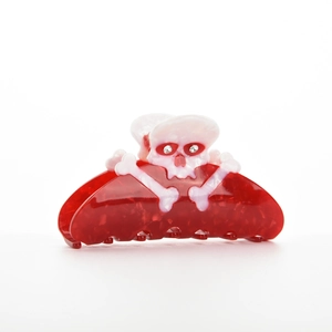 Halloween skull hair claw clip in red and white marble resin with rhinestones