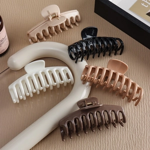 Set of five large minimalist matte silicone shark hair claw clips in earthy neutral colors