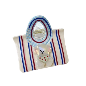 Pince à cheveux sac à main en acétate rayé rouge avec décoration de chien 3D