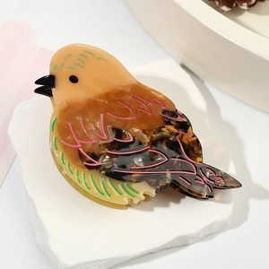Pince à cheveux en acétate en forme d'oiseau avec motifs de plumes colorées