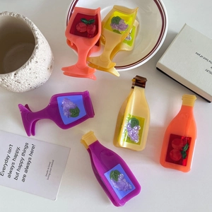 Creative resin hair claws shaped like colorful soda bottles and wine glasses with fruit details