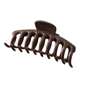 Large chocolate brown silicone shark hair claw clip with glossy finish on white backdrop