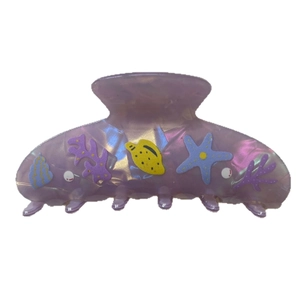 Iridescent starfish and seashell acetate hair claw clip with nautical marine charms
