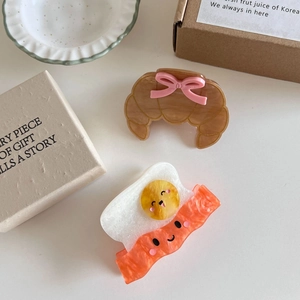 Cute croissant and fried egg food hair claws with smiley face for girls creative hair styling