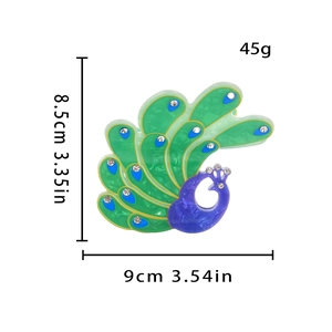 Detail view of colorful peacock claw clip with dimensions 8.5cm height and 9cm width