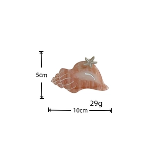 Detail showing dimensions of conch shell hair claw with pink marble acetate and starfish