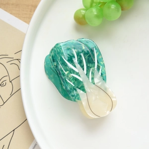 Detailed view of cabbage shaped cellulose acetate hair claw with high quality metal spring