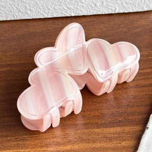 Pince à cheveux en acétate en forme de cœur rose et blanc avec motif marbré élégant