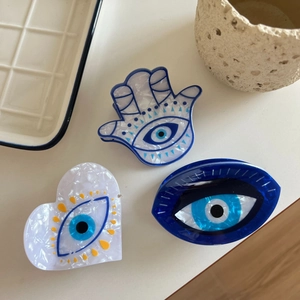 Handcrafted Evil Eye hair claws in Hand of Fatima and heart shapes with marble texture