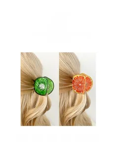 Détails des pinces à cheveux kiwi et orange avec textures de fruits réalistes