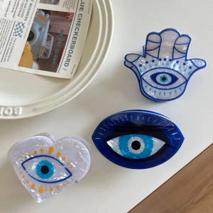 Blue Evil Eye hair claw clips set with Hamsa hand and heart shapes in acetate finish