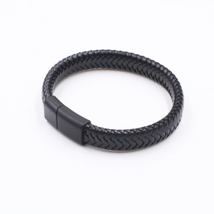 Men's minimalist braided black leather bracelet featuring a matte black magnetic clasp
