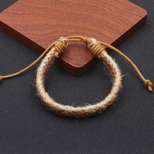 Handmade woven hemp rope and brown leather bracelet with adjustable pull-cord closure