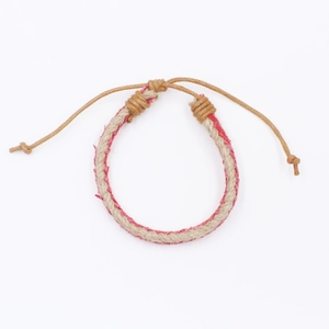 Handmade ethnic braided hemp rope bracelet with adjustable red and natural cord design