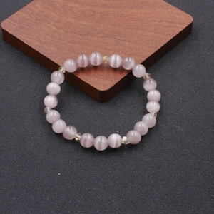 Elegant pink cat eye stone beaded bracelet with faceted clear spacers for women