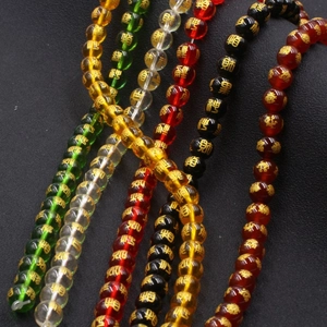 Handmade agate prayer beads with gold lucky charms in green, yellow, red, and black