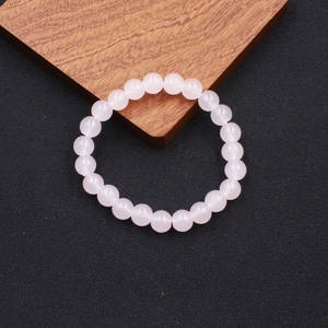 Handmade beaded bracelet with natural pink crystal stones and elastic cord design