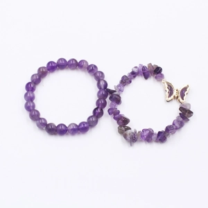 Natural amethyst beaded bracelet set with irregular stones and butterfly charm