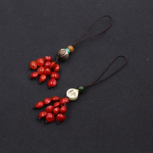 Handmade red bean phone charm with lotus seed beads and traditional tassel rope strap