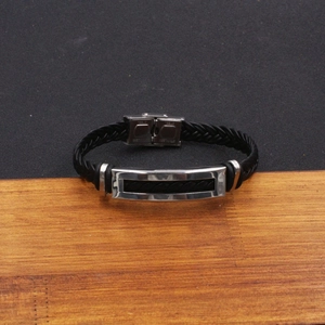 Men's vintage braided leather bracelet with hollow stainless steel buckle and metallic finish