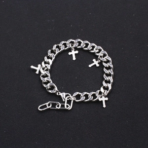 Silver Cuban link bracelet with four cross charms and adjustable lobster clasp for men and women