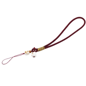 Red braided phone strap with dual white lucky cat charms and bodhi beads details