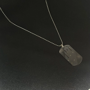 Men's silver dog tag necklace with engraved name and blood type fields on ball chain