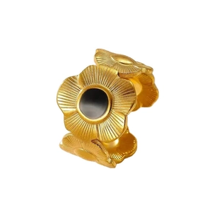 Adjustable golden stainless steel open ring with floral design and black circular inlay