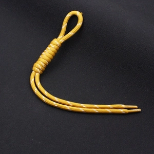 Vibrant yellow braided polyester drawstring with white polka dots and dual cord ends