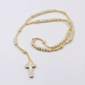 Classic 8mm ivory wooden rosary necklace with carved crucifix and Jesus figurine