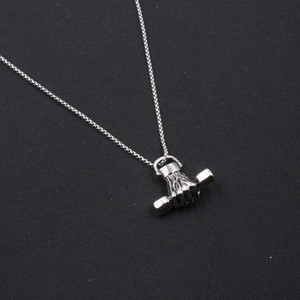 Vintage silver fist clutching dumbbell pendant on a box chain for men's hip hop style