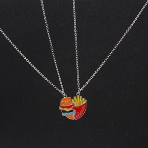 Matching Best Friends burger and fries heart puzzle pendant necklace in alloy