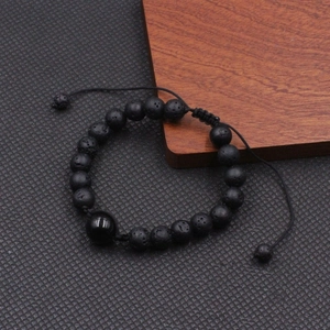 Pulsera tejida a mano con cuentas de piedra de lava 12mm y centro de obsidiana