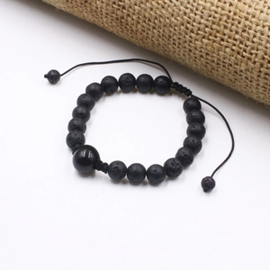 Pulsera ajustable de piedra de lava negra con obsidiana pulida y cordón trenzado