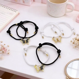 Pulseras tejidas a mano con dije de mariposa para parejas y amigos en blanco y negro