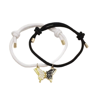 Pulseras de pareja de mariposa tejidas a mano con colgantes magnéticos en blanco y negro